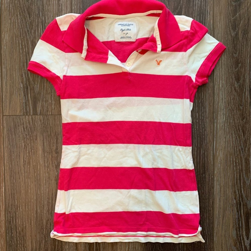 Pink & white striped polo by American Eagle size small
